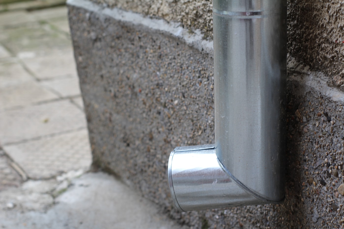 Seamless aluminum gutters and downspout on a Long Island house