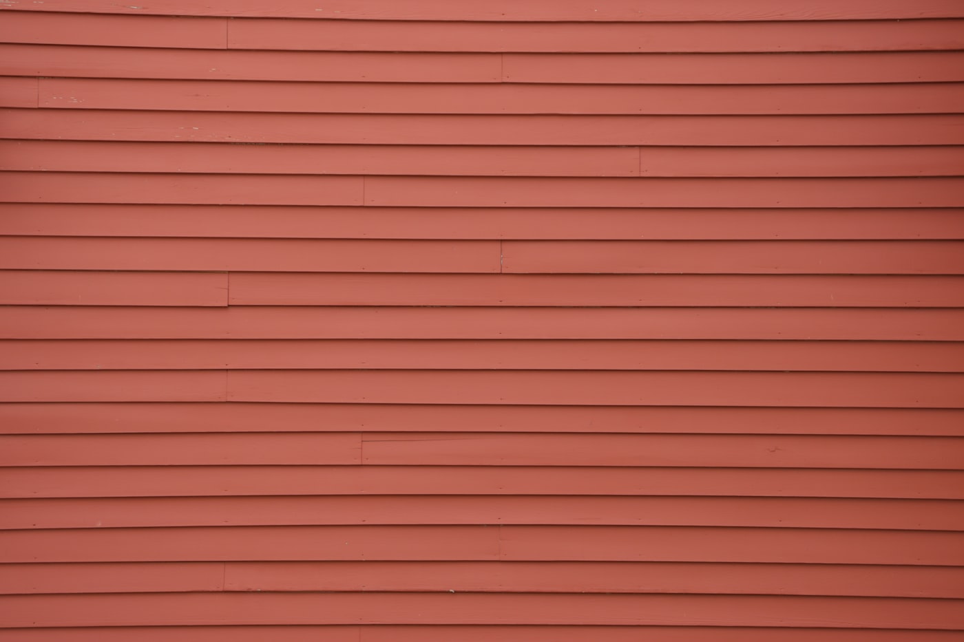 New fiber cement siding and trim installed on a Long Island cape